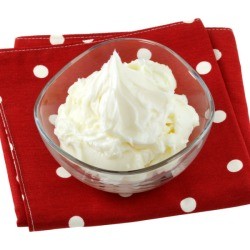 Bowl of vegetable shortening on a red polka dot napkin.