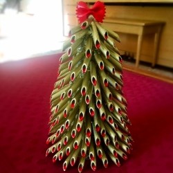 Pasta Christmas Tree - finished pasta tree on a red surface