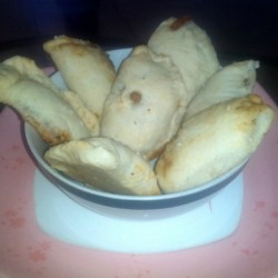 Sardina Empanadas in bowl ready to eat