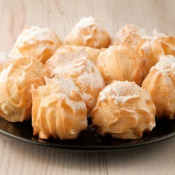 French Breakfast Puffs on a black plate