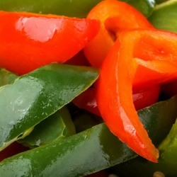 Red and green pepper strips, ready for stir fry.