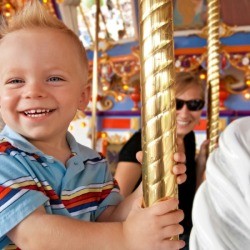 Little boy on carousel 