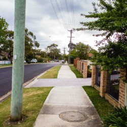 Utility pole in a residential area.