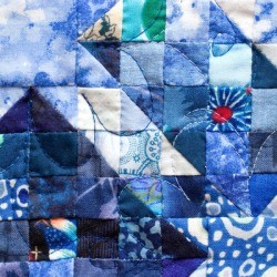 Closeup of blue quilt