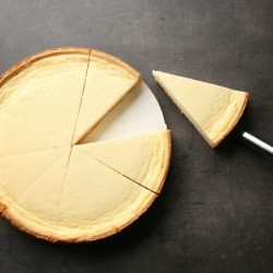 Cheesecake with slice taken out