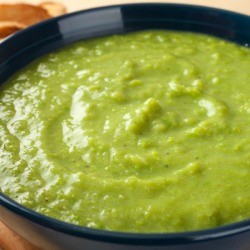 Pea soup in a black bowl