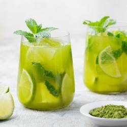 Fresh Mint Punch in glasses with lime slice