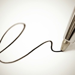 Ball point pen writing on paper.