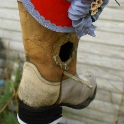 Cowboy boot bird house.