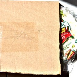 A cardboard package to store tortillas in the freezer.