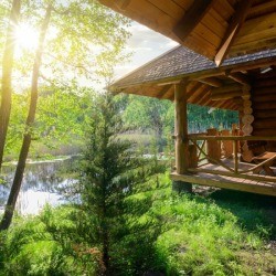 Wood cabin on a river.