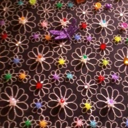 Baby Photo Album - open petal flower decorations and a purple dragonfly