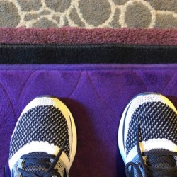 Floor mats stacked on top of each other for padding when exercising.