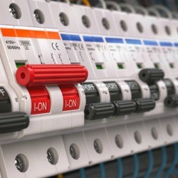 Closeup of a fuse box, with a two pole breaker.
