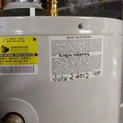 Date of installation written on hot water heater.