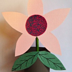 Toilet Roll Flower-in-a-Pot Kids Craft - finished flower in pot with the blue dots in the flower center