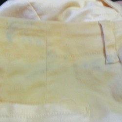 Black Dye Transferred onto Yellow Shorts 