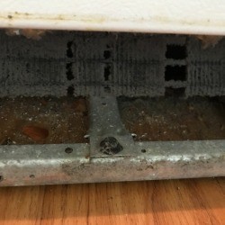 A dirty refrigerator coil.