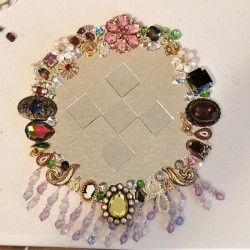 BeJeweled' Mirror = finished mirror with mirror tiles in center