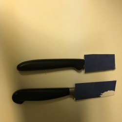 Homemade knife sheaths made from cardboard.