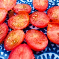 Cherry tomatoes cut in half.