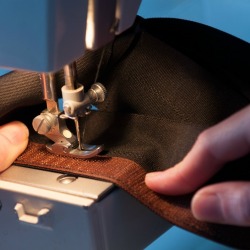 Seamstress Sewing on Velcro.