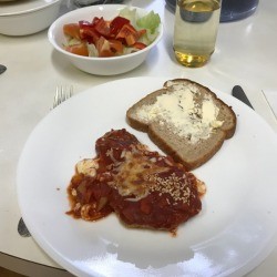 Eggplant Custard Bake with bread on dinner plate 