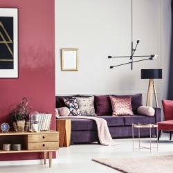 Living room with red a black accents.