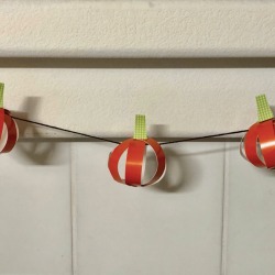 Pumpkin Garland - three paper pumpkins on yarn 