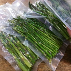 Asparagus in food saver bags.