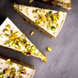 Pistachio Cake on a grey surface.