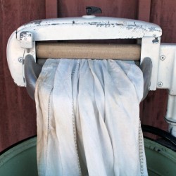 An old fashioned wringer washer.