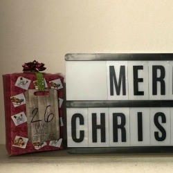 Giftbox Christmas Countdown Calendar - calendar sitting on a shelf with the Merry Christmas sign and the doily tree sign