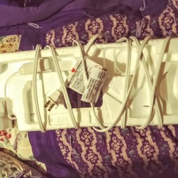 Using recycled styrofoam to wrap a cord.