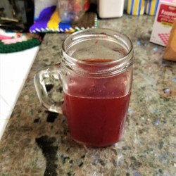 A glass of iced tea flavored with sugar free gelatin.
