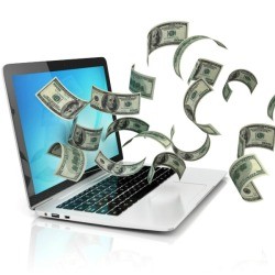 money flying around about a laptop