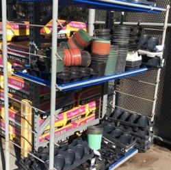 Free Flower Pots at Lowe's Garden Center - shelves with plastic pots