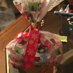 A goodie bag with candy and other items.