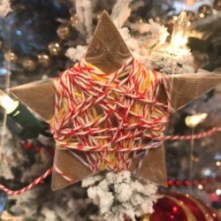 Cardboard Star Ornament - ornament hanging on the tree