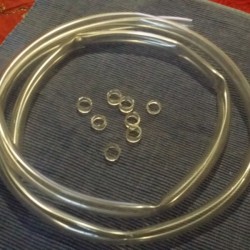 Plastic tubing cut into small sections to be used as a nasal breathing insert.