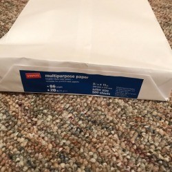 A ream of printing paper that will be saved by the free prints at the library.