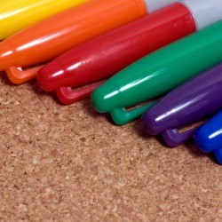 multiple caps of different color Sharpie markers