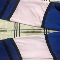 White Polyester Spandex Top Turned Pink - pinkish white area on polyester sleeves