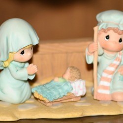 Precious Moments figurines in a nativity.