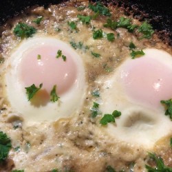 Crispy Parmesan Eggs in pan