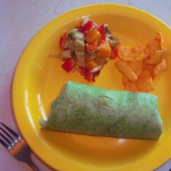 Avocado Mango Salsa on plate with filled tortilla