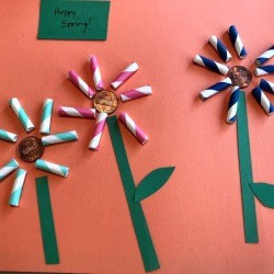 Straw Flowers on Paper - small rectangle of green paper that says Happy Spring 