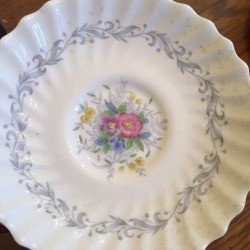 Determining the Value of Old Estate China - scalloped plate with blue floral pattern around the near edge and floral pattern in the center