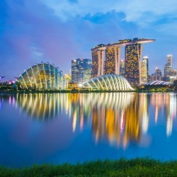 Singapore skyline at dusk.