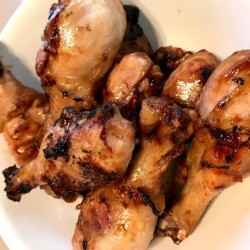 finished Grilled Citrus Soy Chicken Drumsticks on plate